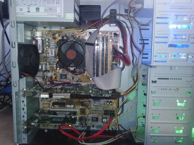 Side view of  case 12cm blue fan top green bottom heat sink fan rear outtake fan and psu.jpg