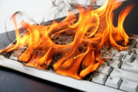 15746035-burning-computer-keyboard.jpg